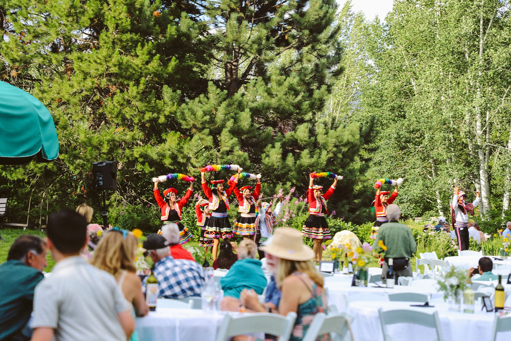 Peruvian dancers performing on the Green