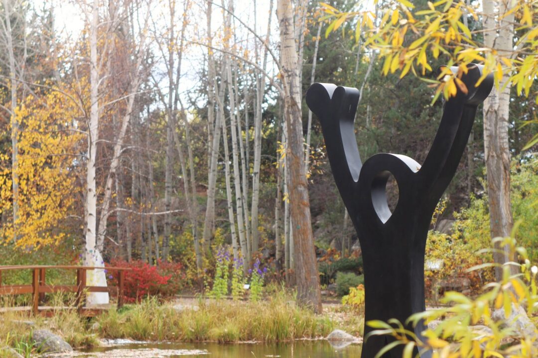 Joy of Life statue fall leaves
